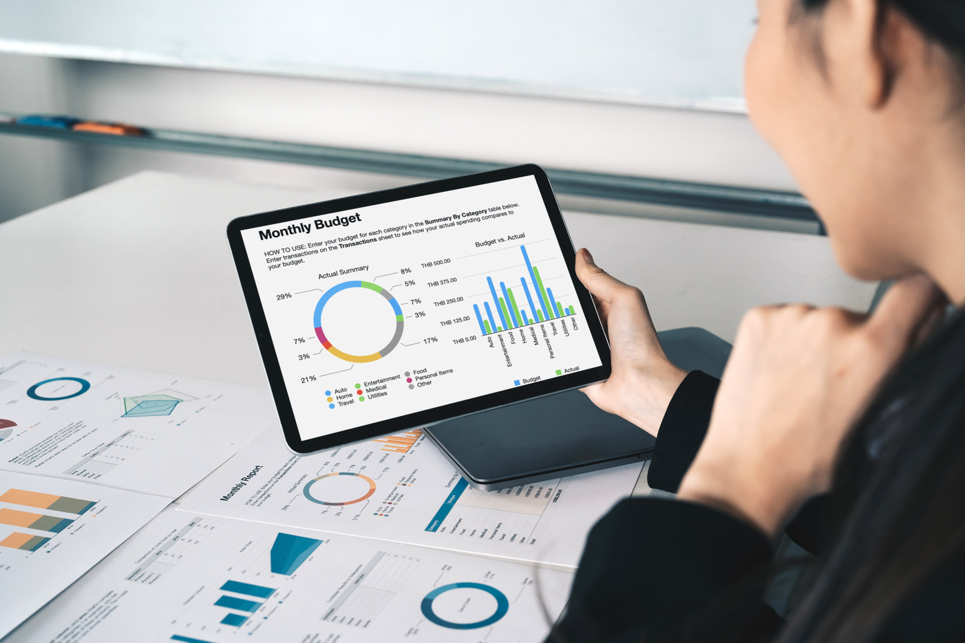 Reviewing a budget on a tablet